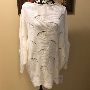 Soft wide dolman sleeved acrylic mixed open/closed knit scallop hem sweater
